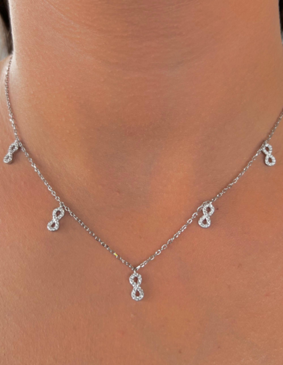 COLLAR DE PLATA CON 5 SIGNOS INFINITOS Y CIRCONES